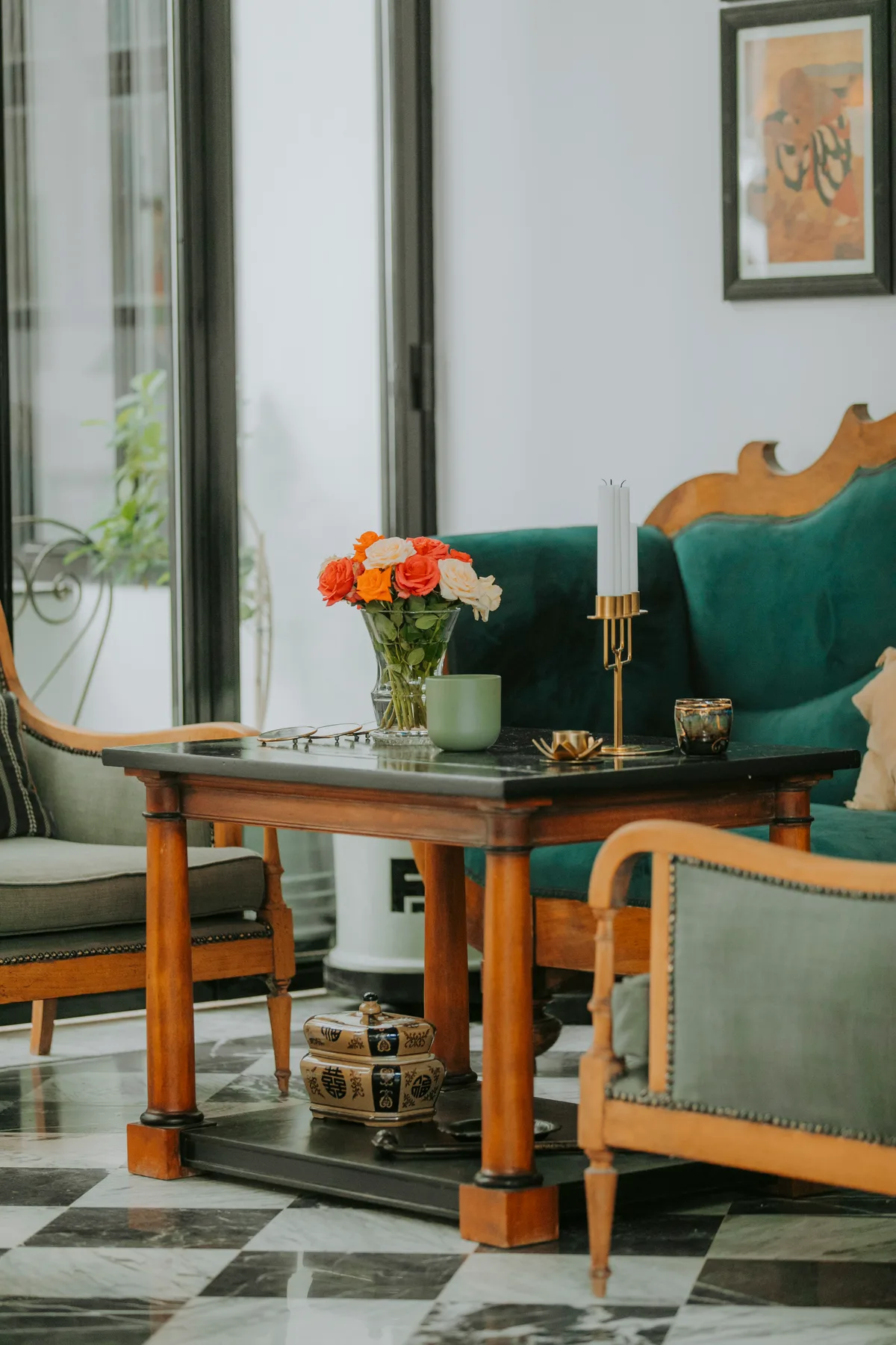 Green velvet and flowers in the lounge